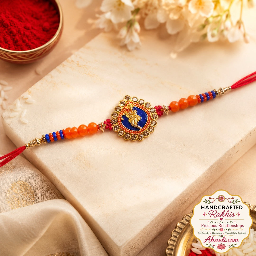 Handcrafted Lord Krishna metal rakhi with stone embellishments and decorative beadwork for Raksha Bandhan