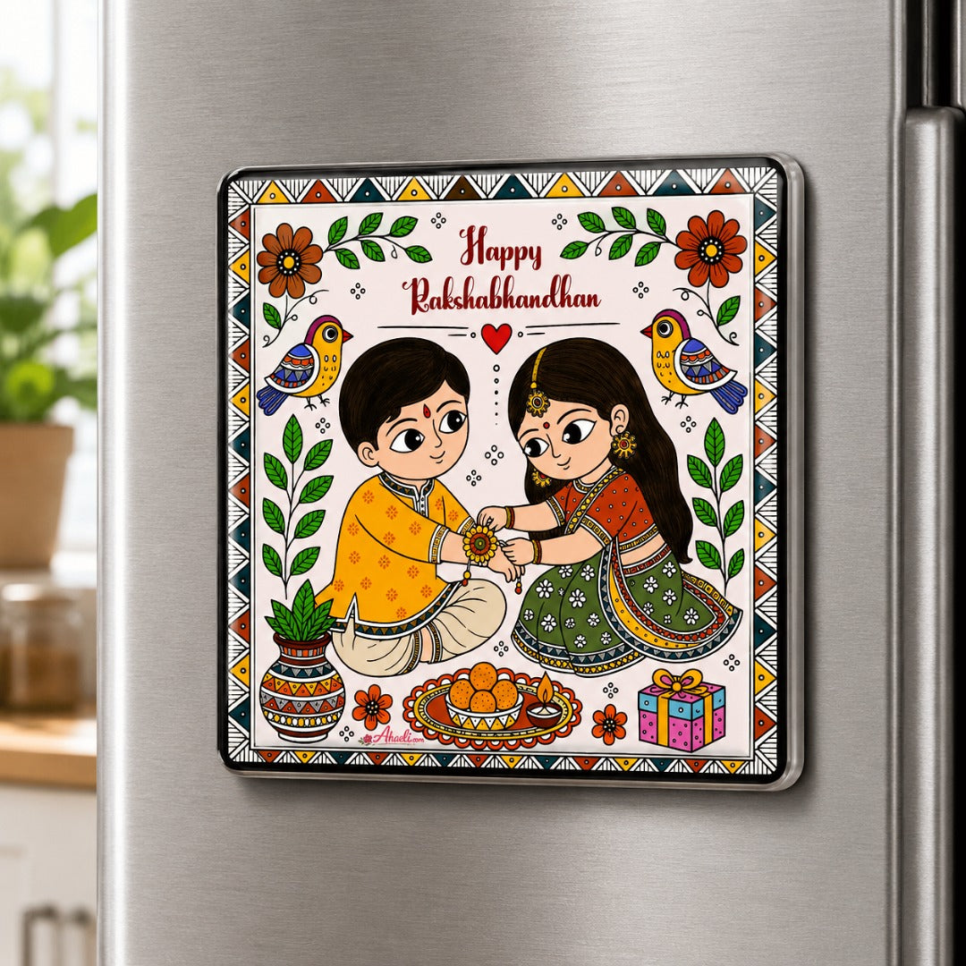 Madhubani Raksha Bandhan fridge magnet displayed on a refrigerator featuring brother and sister celebrating Rakhi, handmade Indian folk art decor.
