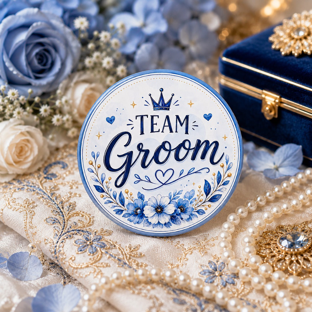 Team Groom wedding badge with blue floral design for groom squad and wedding celebrations.