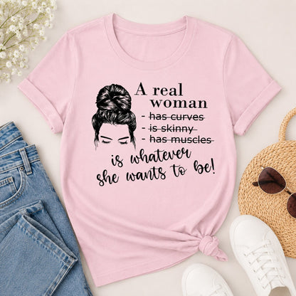 A Real Woman women's cotton t-shirt in light pink featuring a body positive graphic design