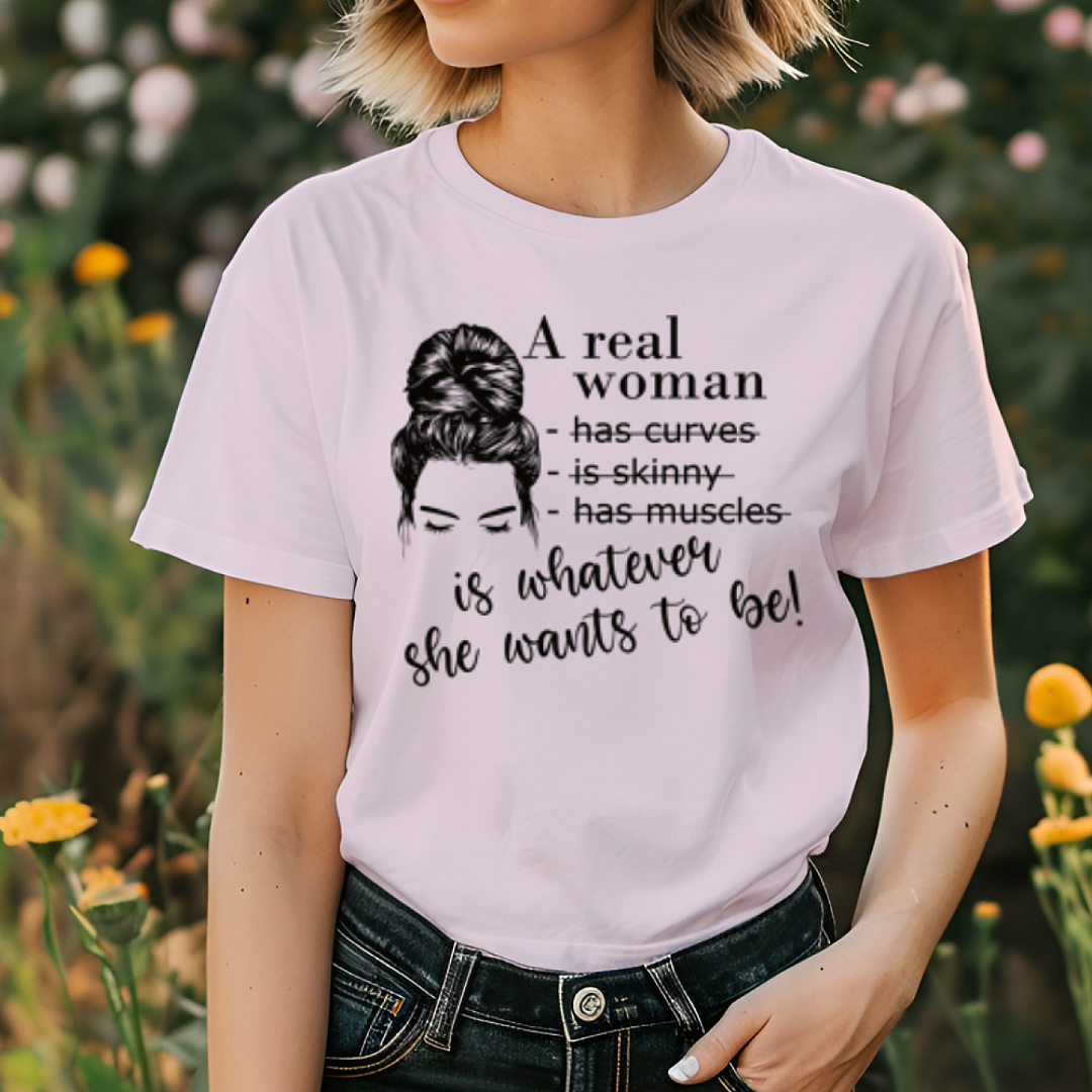 A Real Woman women's cotton t-shirt in light pink featuring a body positive graphic design