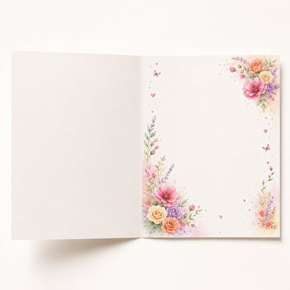 Open Blossom Wishes birthday card with watercolor floral border and blank space for a personal message