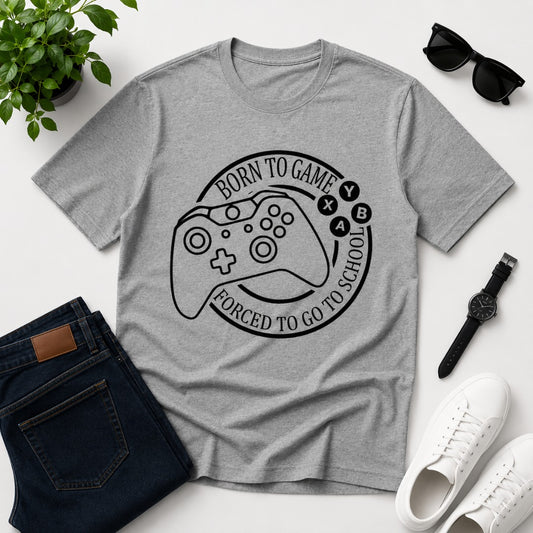 Men's grey cotton T-shirt featuring a gaming controller graphic with the funny quote "Born to Game, Forced to Go to School".