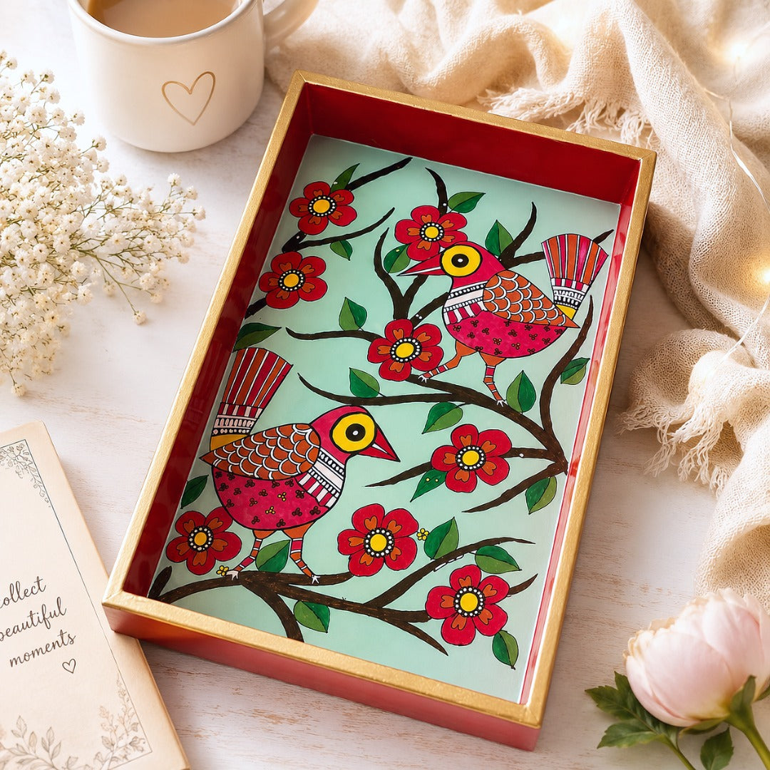 Angled view of Cheerful Birds Mithila Art Wooden Tray, handcrafted serving tray with colorful bird and floral folk art.
