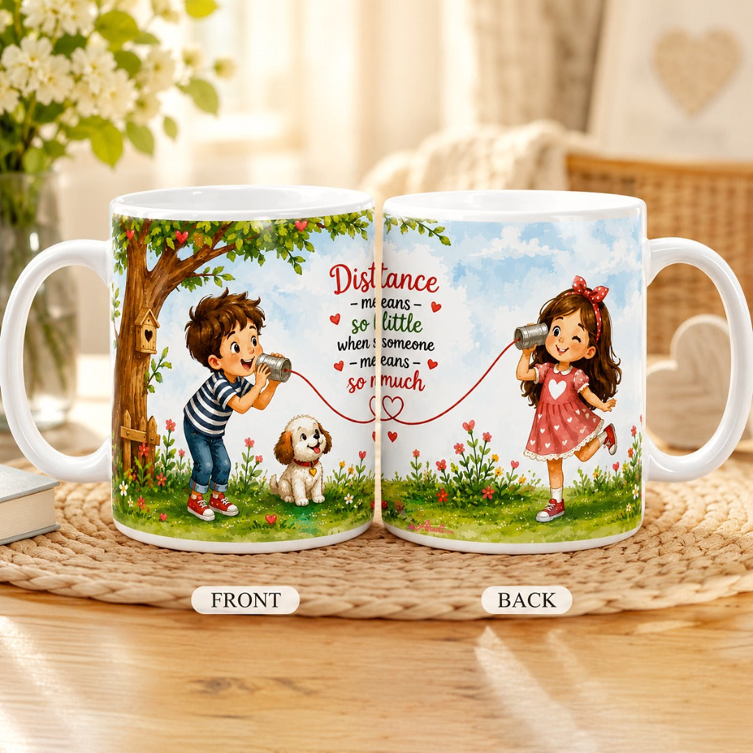 Front and back view of the Distance Means So Little Coffee Mug featuring a boy and girl connected by a tin can telephone, heartfelt quote, and charming watercolor artwork on white ceramic mugs.