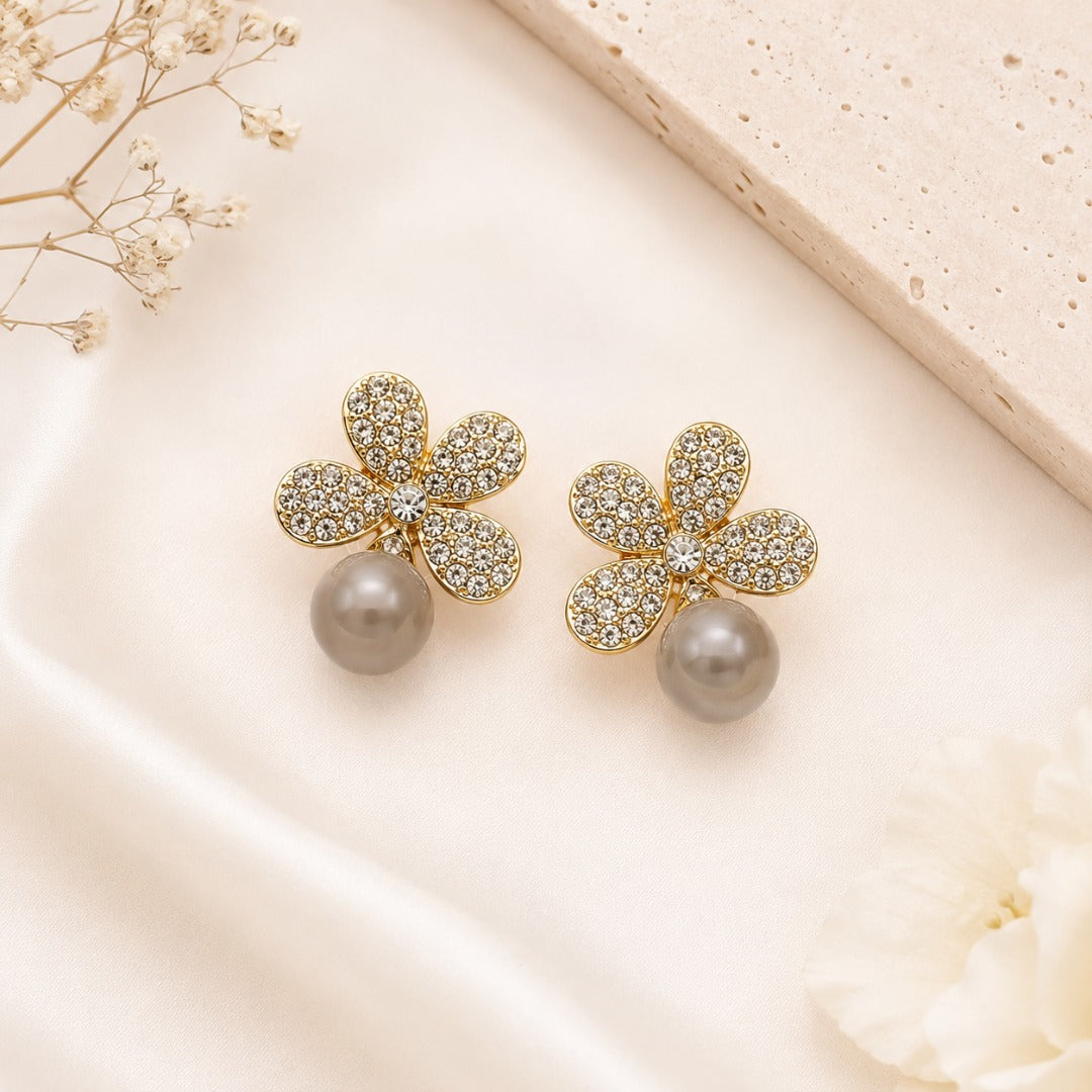 Elegant Crystal Flower Pearl Droplet Stud Earrings for Women featuring gold-tone floral crystal studs with an artificial pearl droplet.
