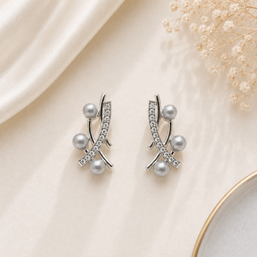 Elegant Pearl Crystal Crossover Stud Earrings for Women with silver-tone crossover design, sparkling crystal accents and pearl details.