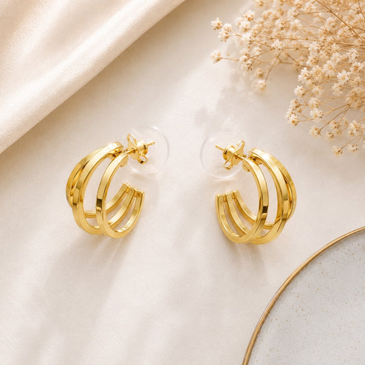 Elegant triple band gold hoop stud earrings for women with a modern minimal open hoop design, perfect for everyday wear, office wear, parties, and gifting.