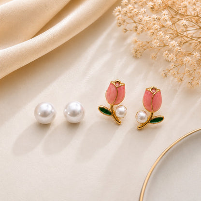 Elegant Tulip & Pearl Stud Earrings Set for Women featuring a pair of classic white pearl studs and pink tulip flower stud earrings.