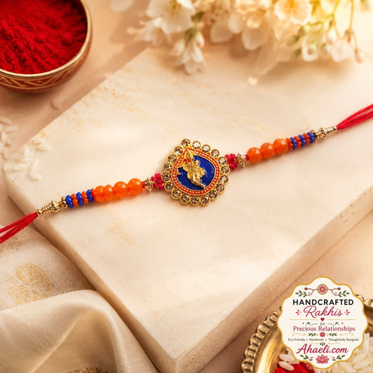 Handcrafted Lord Krishna metal rakhi with stone embellishments and decorative beadwork for Raksha Bandhan