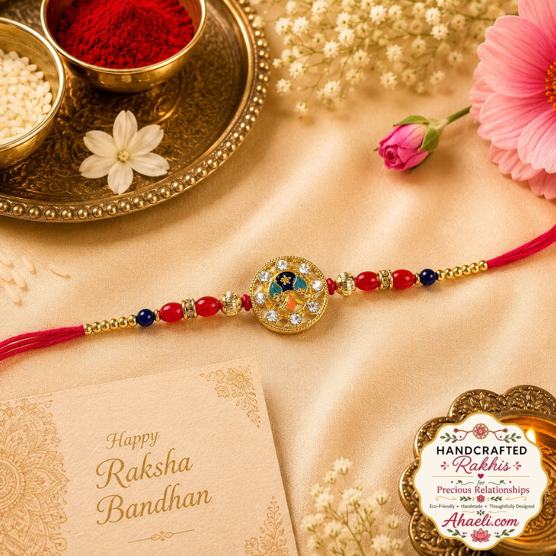 Handcrafted peacock stone rakhi with premium metal centerpiece and decorative stones for Raksha Bandhan