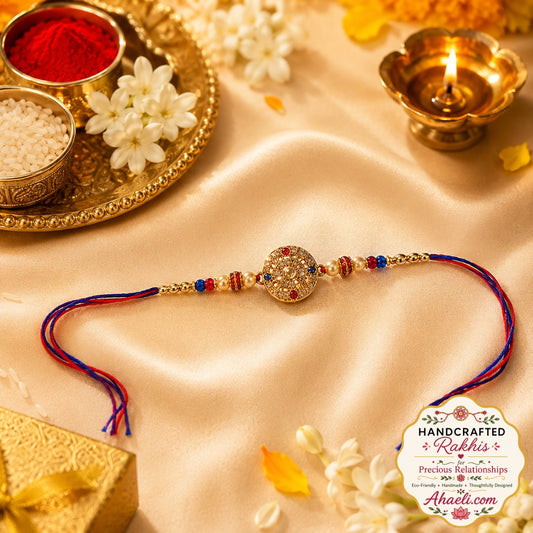 Handcrafted stone studded pearl rakhi with decorative beadwork and traditional festive design
