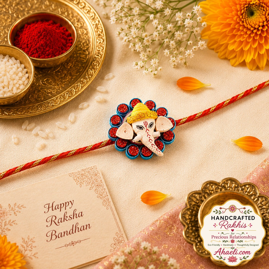 Handmade paper quilled Ganesha rakhi featuring Lord Ganesha design for Raksha Bandhan.