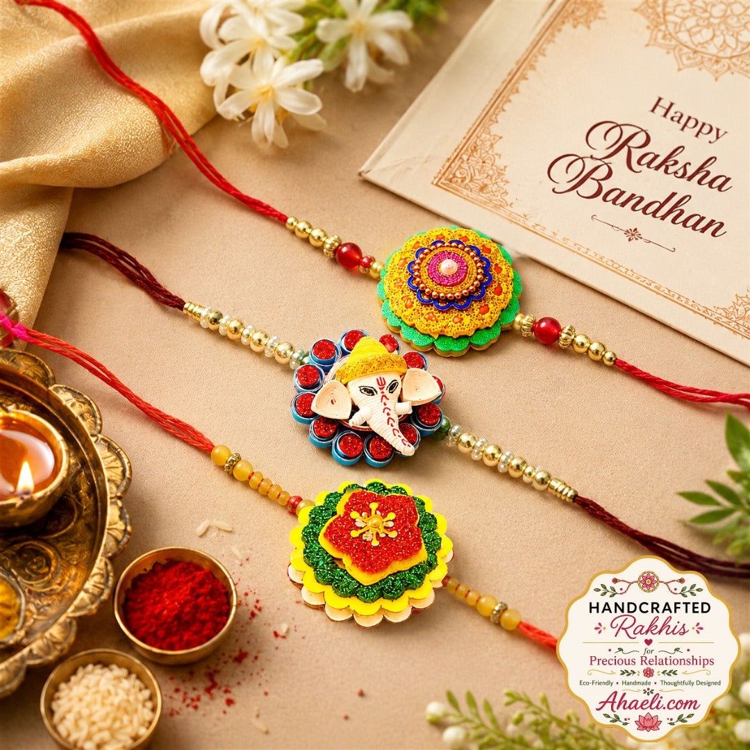 Handmade paper quilled rakhi set of 3 featuring Ganesha and floral rakhi designs for Raksha Bandhan.