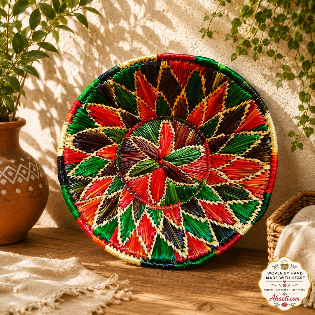 Handwoven red and green floral Sikki grass basket handmade in Bihar for sustainable home décor and wall decoration