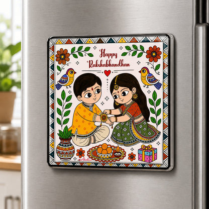 Madhubani Raksha Bandhan fridge magnet displayed on a refrigerator featuring brother and sister celebrating Rakhi, handmade Indian folk art decor.