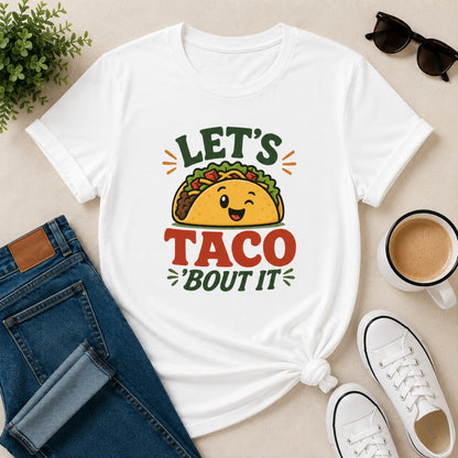 Women's white cotton T-shirt featuring a cute smiling taco illustration and the funny phrase "Let's Taco 'Bout It".