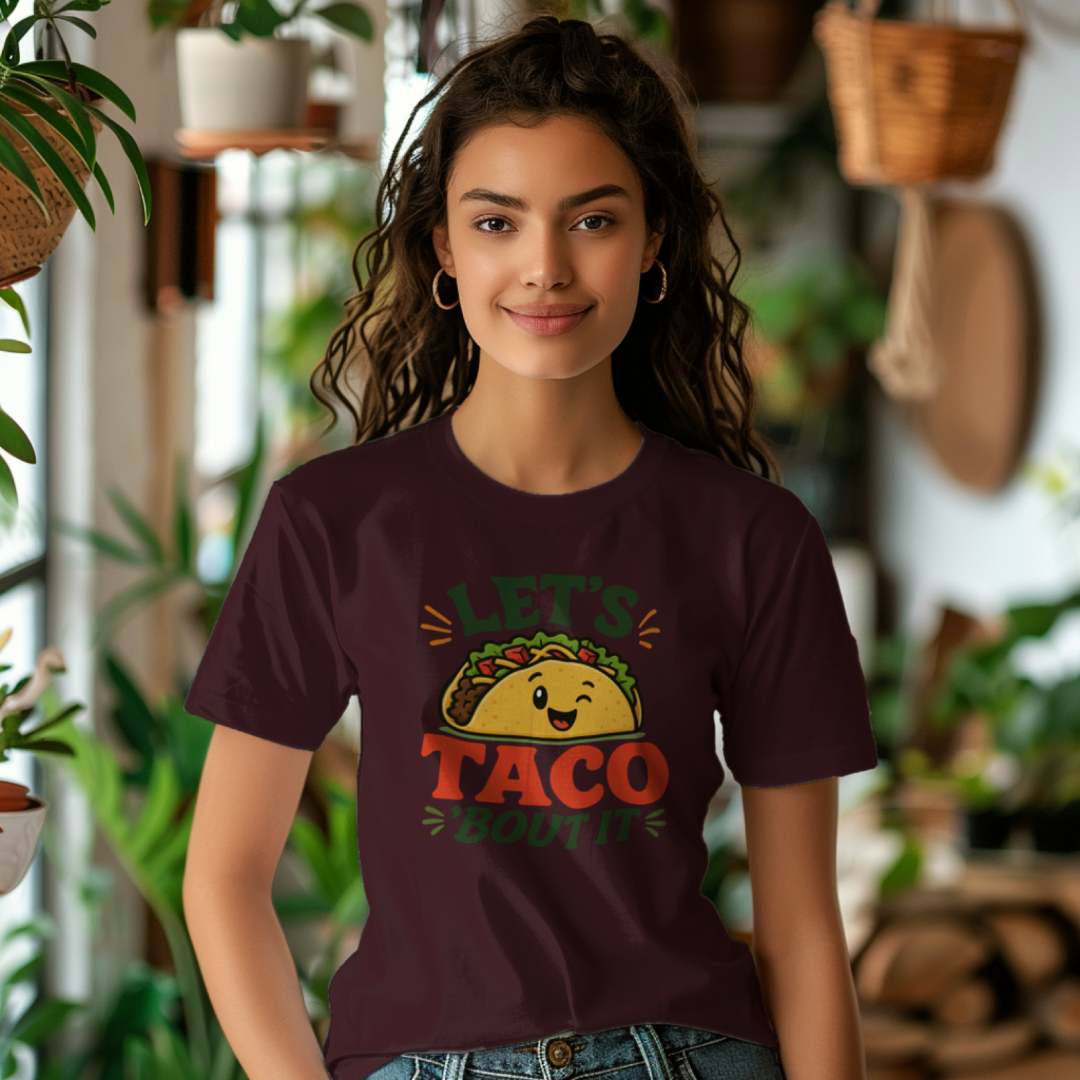 Let's Taco Bout It women's cotton t-shirt in maroon featuring a taco lover graphic design