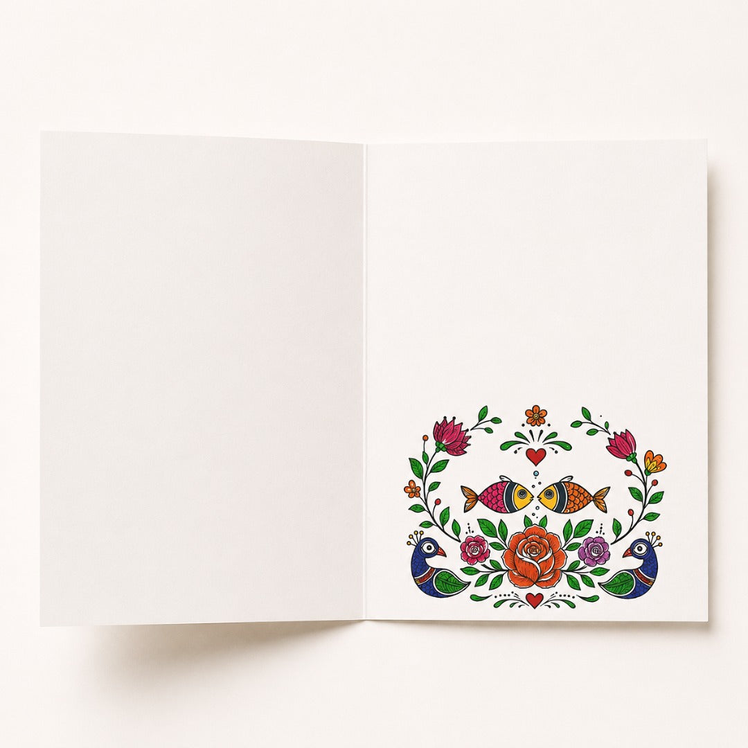 Open Madhubani birthday card with traditional peacock, floral and folk art design inside