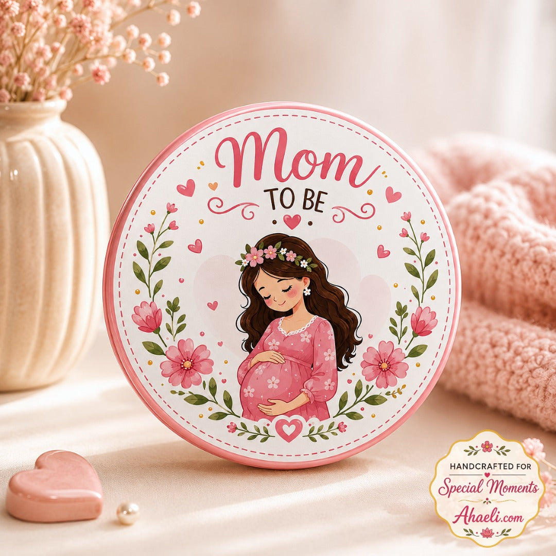 Mom-to-Be Baby Shower Badge with floral pregnant mother illustration, 58mm glossy round metal keepsake pin for baby shower, pregnancy announcement and gender reveal celebration.