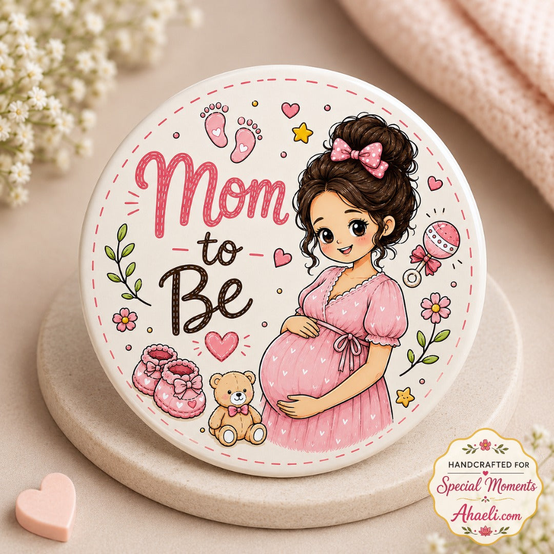 Mom to Be baby shower badge featuring a pregnant woman illustration on a premium round pin for pregnancy announcement celebrations