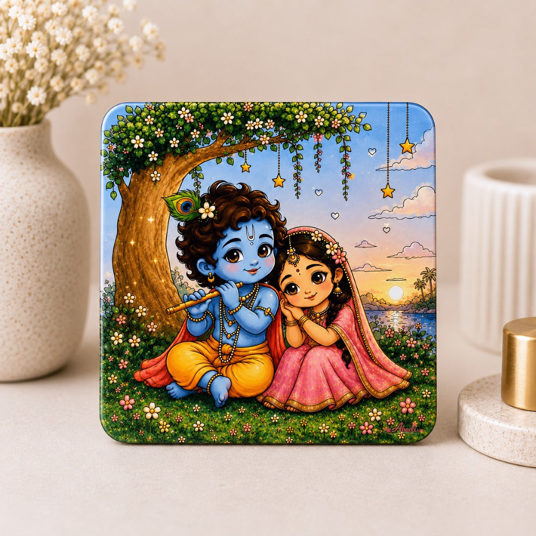 Cute Radha Krishna acrylic fridge magnet featuring Lord Krishna playing the flute with Radha under a flowering tree, premium square refrigerator magnet for home decor and spiritual gifting.