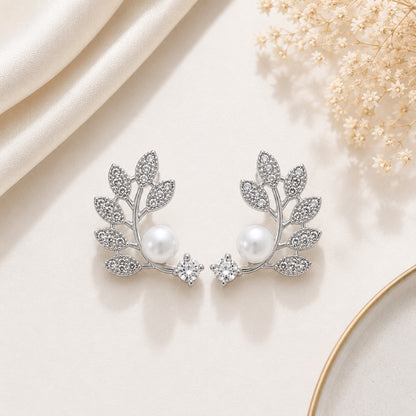 Silver leaf vine stud earrings with pearl and crystal detailing for women suitable for daily wear and special occasions.
