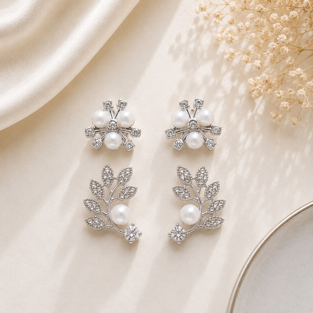 Silver stud earrings combo set for women including floral pearl studs and leaf vine stud earrings for everyday and party wear.