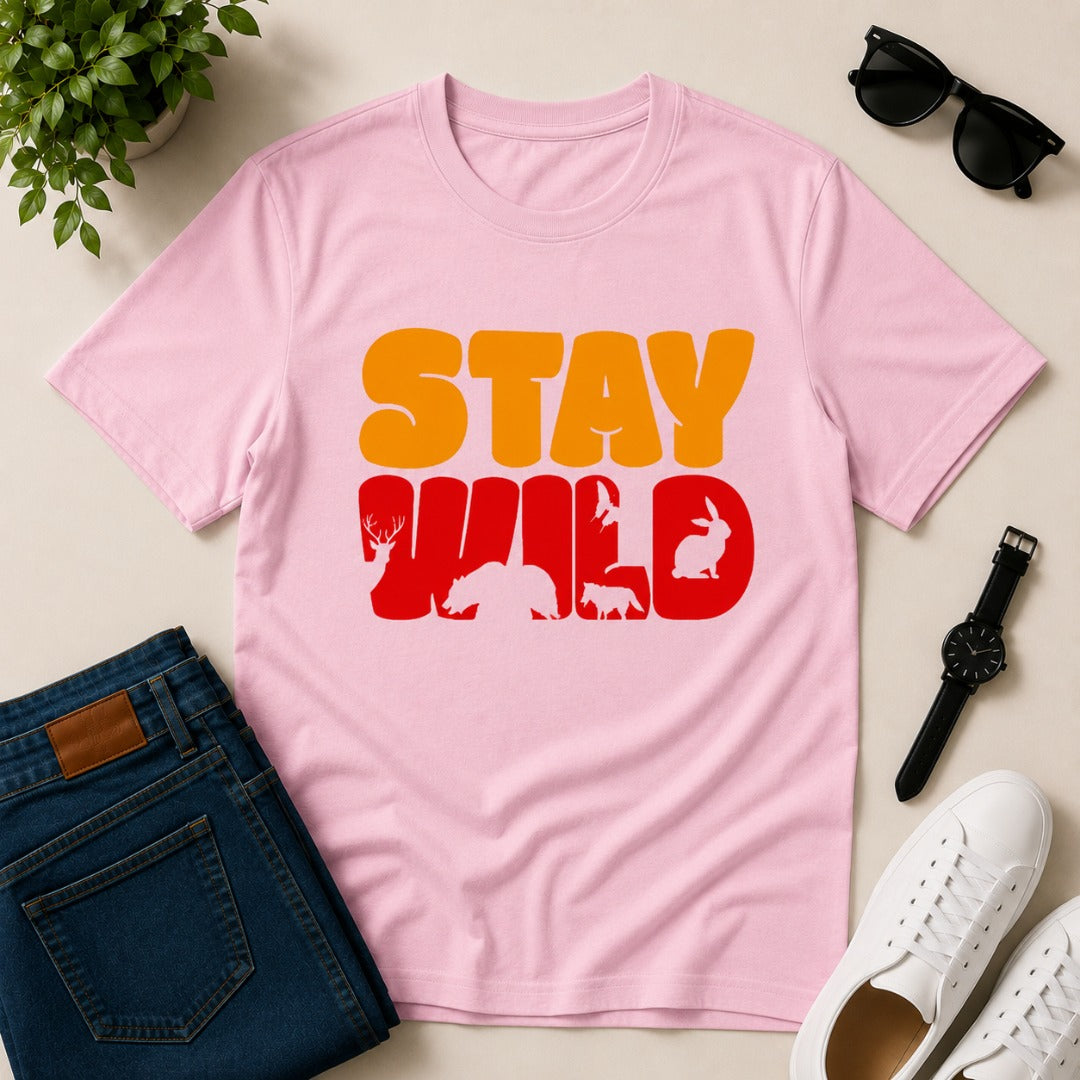 Men's light pink cotton T-shirt featuring a Stay Wild graphic with bear, deer, fox, rabbit, and bird silhouettes in a vintage wildlife design.