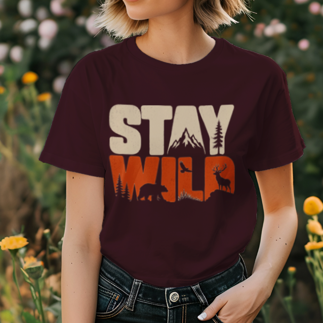 Stay Wild women's cotton t-shirt in maroon featuring a wildlife-inspired graphic design
