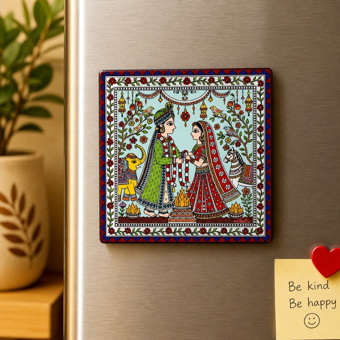 Traditional Mithila wedding fridge magnet displayed on a refrigerator featuring Madhubani folk art with bride and groom, handmade Indian home decor.