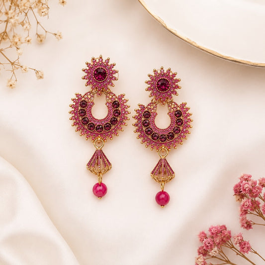 Traditional pink crystal chandbali drop earrings for women with gold-tone finish and bead drop for festive and wedding wear.