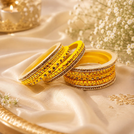 Yellow traditional 10 bangle set for women featuring stone work detailing, perfect for Haldi ceremonies, weddings, festivals, and bridal wear.